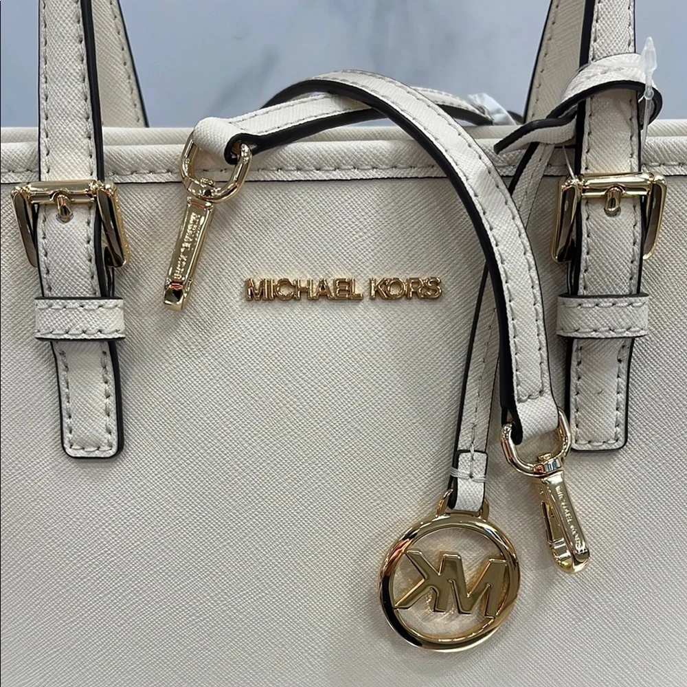 Michael Kors Jet Set Travel Extra-Small Top-Zip Tote Carryall Bag
Light Cream - Picture 2 of 16